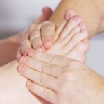 A woman receiving plantar fasciitis treatment